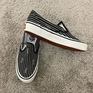 Black and White Stripped Slip-on Vans.